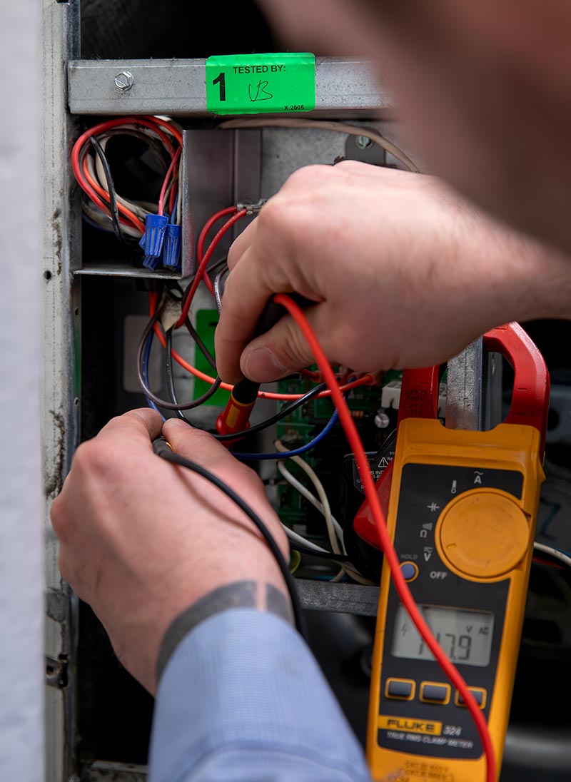 Tommy Garner Air Conditioning hands wiring