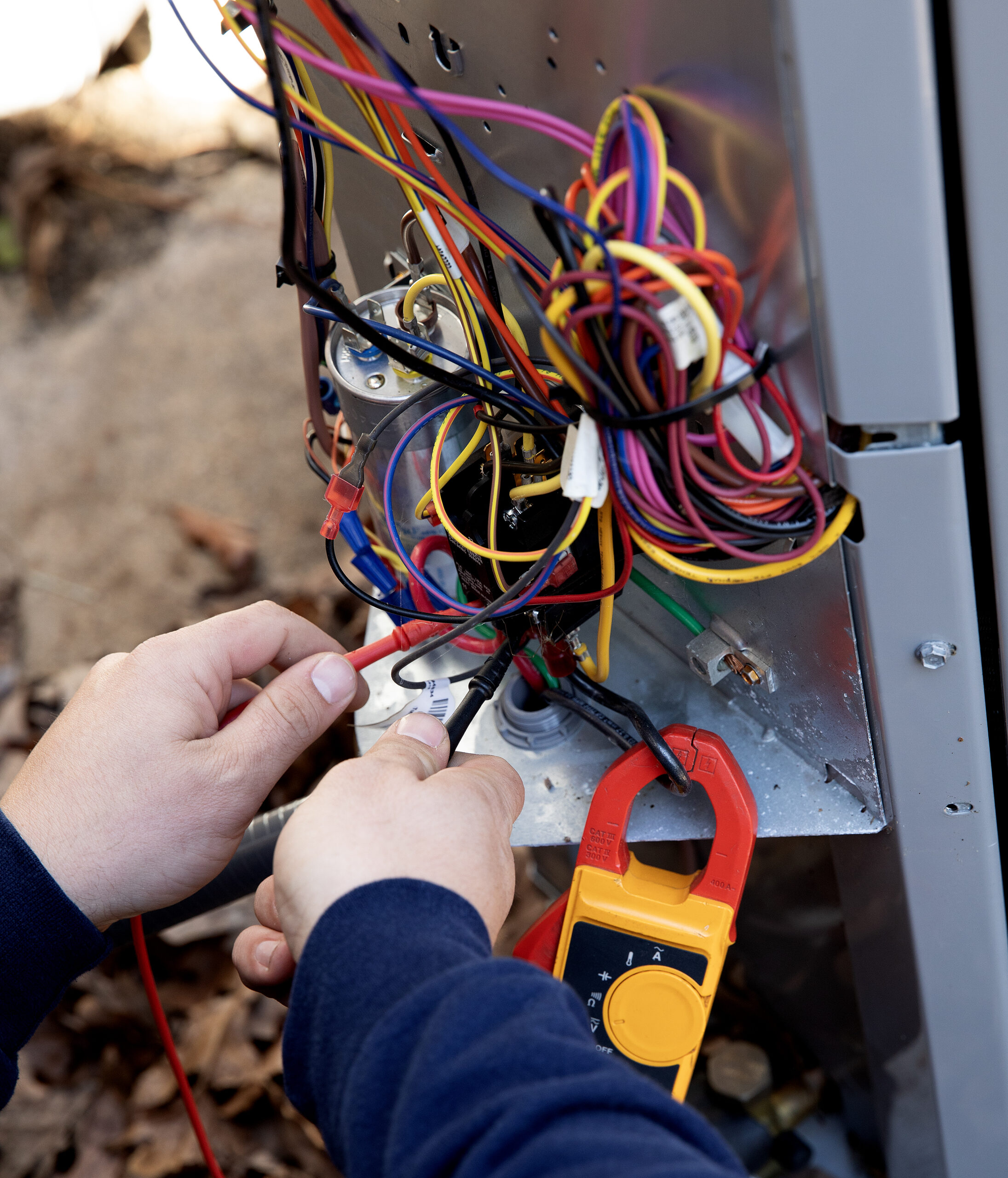 Testing an A/C Unit during regular seasonal maintenance